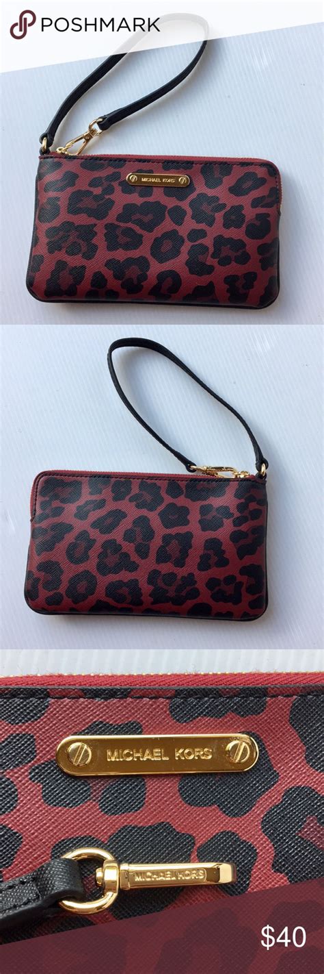 michael kors leopard wristlet.